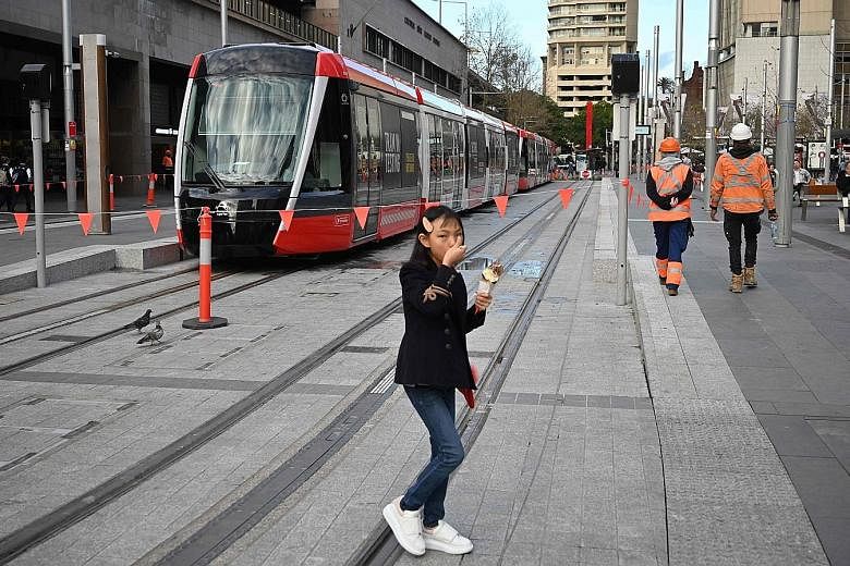 After three years of delay, a light rail tram finally arrived at Circular Quay when it reached the end of the 12.7km line for the first time in Sydney yesterday. Cost blowouts, legal disputes, delays to construction and major disruption to businesses