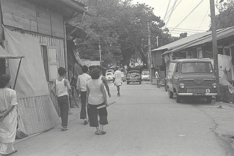 A street in Kampung Potong Pasir, the village where Ms Chia lived. She had only the bare necessities growing up in a small attap house there.