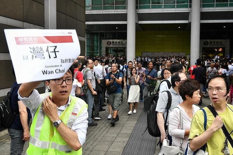 Massive queues formed for shuttle buses outside Tiu Keng Leng Station. Four major lines - Island, Kwun Tong, Tseung Kwan O and Tsuen Wan - were hit by the protests.