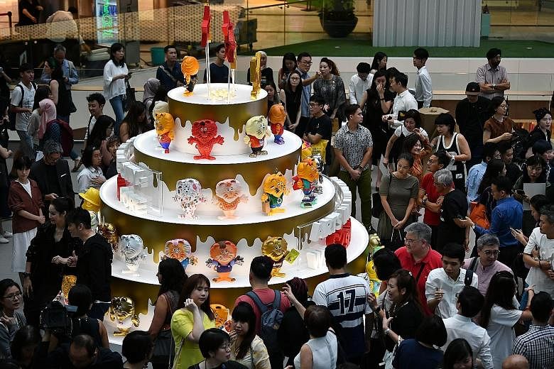 President Halimah Yacob spoke on the sidelines of an exhibition showing 200 figurines of Singa the lion at Raffles City shopping mall yesterday.