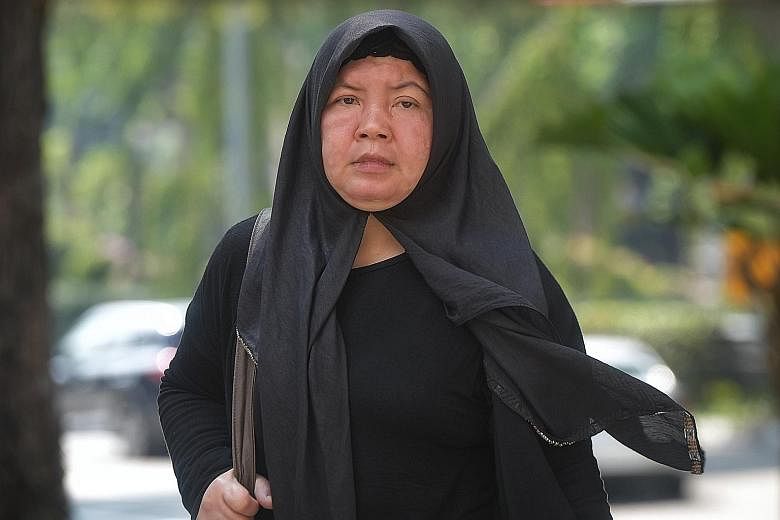 Ms Khanifah (above), a mother of two, suffered permanent disfiguration, including a deformed left ear and scars on her forehead, among other injuries. The prosecution called the abuse inflicted on her by Zariah Mohd Ali (left), 58, and her husband Mo