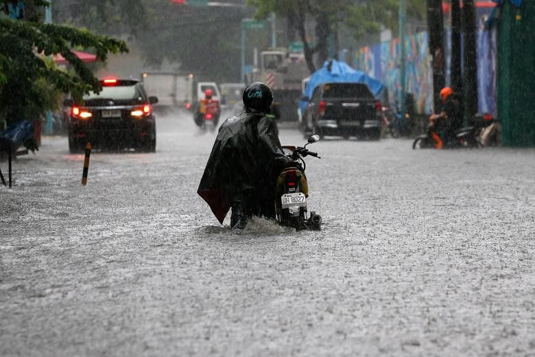 Heavy rain shuts courts, schools in Philippines capital | The Straits Times