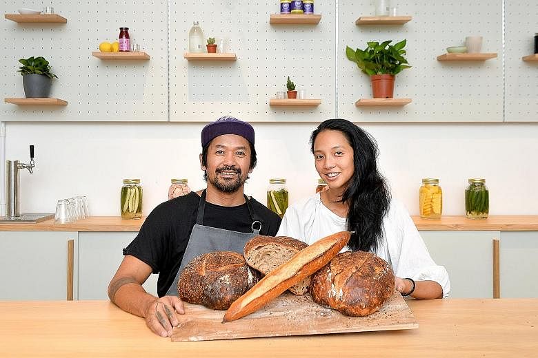 Starter Lab founders Emerson Manibo (left) and Min Siah at their bakery's first overseas outpost in Havelock Road, which seats 35 diners.