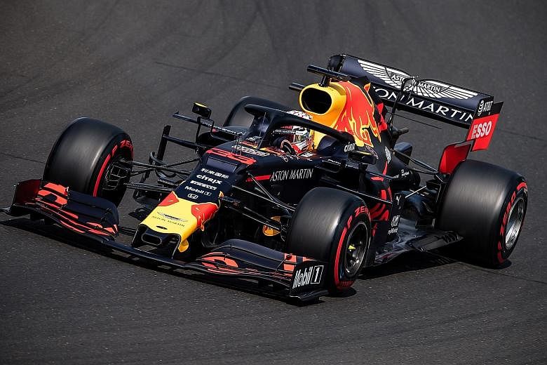 Red Bull's Dutch driver Max Verstappen steering his car during the qualifying session of the Hungarian Grand Prix at the Hungaroring circuit yesterday. 