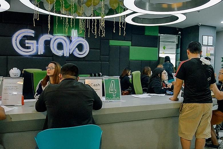Grab's office in Manila. The ride-hailing firm, the most valuable South-east Asian unicorn at US$14.3 billion (S$19.7 billion), has grown exponentially since moving its HQ to Singapore in 2014. It has expanded by targeting multiple markets at the sam