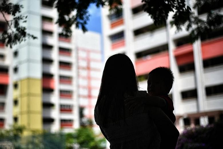 Last year, the authorities disclosed that the median monthly income of a single unwed parent under the age of 35 was $600 in 2017. ST PHOTO: ARIFFIN JAMAR Single mother Khairianti Putri and her daughter Luna, who is two years old. Ms Putri, now 22, s