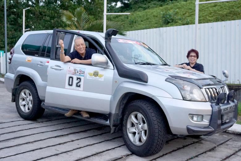 A 2016 file photo of Mr See Lew Hang and his wife Fong Yim Peng on an auto-venture trip to Cambodia. They will be flagged off on their London to Singapore trip with other participants on Saturday.