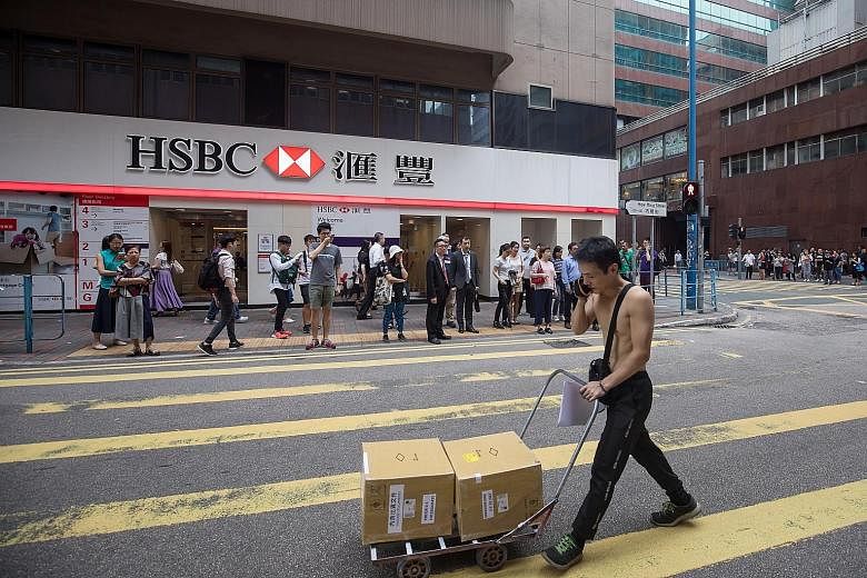DBS Group CEO Piyush Gupta is seen as a potential candidate to helm HSBC, but DBS says he has no plans to leave. An HSBC branch in Hong Kong. Previous searches for HSBC chief executives have looked outside the bank but have always concluded that an i