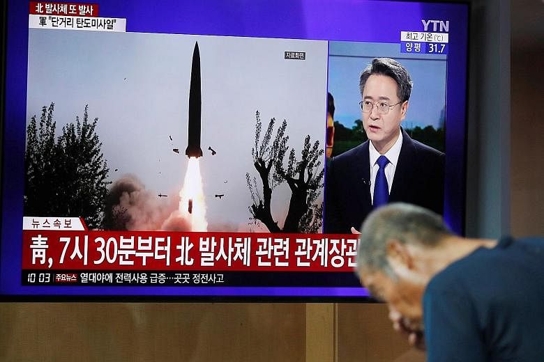 South Korean television reporting yesterday on the North firing two unidentified projectiles from South Hwanghae province into the sea to the east.
