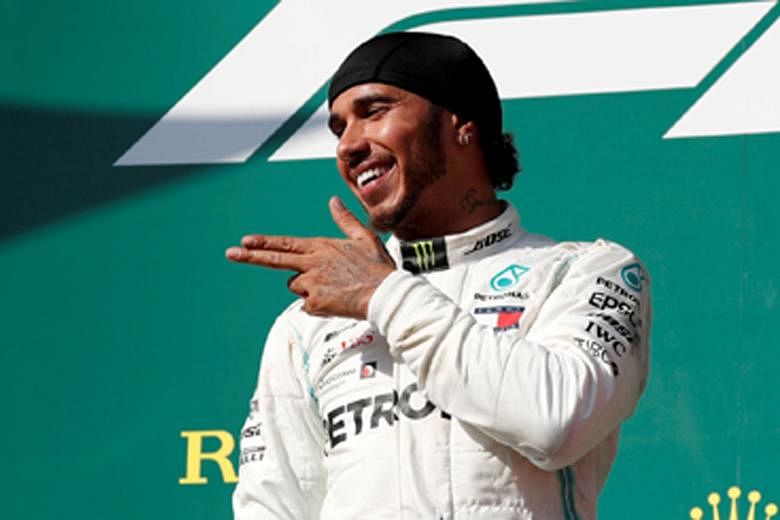 Mercedes' Lewis Hamilton celebrating on the podium at the Hungaroring, where he won his eighth grand prix this season. He says he wants to get more sleep and try things like meditation and reading to aid his recovery.