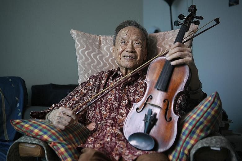 Violinist Julai Tan (in a 2018 file photo) was the oldest performer to take part in last year's National Day Parade.