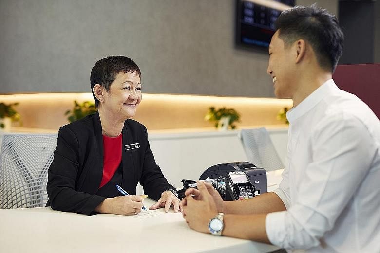 Customer service officer Sue Li, 63, is among Prudential's staff who will benefit from the new scheme. The firm said the scheme is opt-in as some may prefer more disposable income to meet their immediate needs.