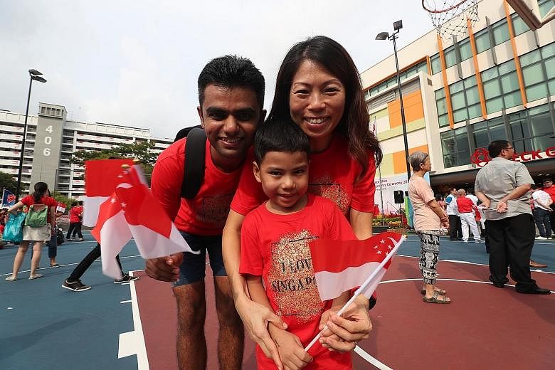 New Singapore citizen Chavda Ankur A, 32, with his Singaporean wife Leong Yi Peng, 38, and son Chavda Keval Ankur, five. ST PHOTO: TIMOTHY DAVID
