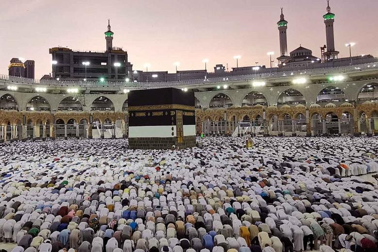 Muslims praying at the Grand Mosque during the annual Haj pilgrimage in Mecca, Saudi Arabia, on Thursday. The haj, one of the world's largest religious gatherings, is one of Islam's five pillars and must be undertaken by all Muslims with the means at