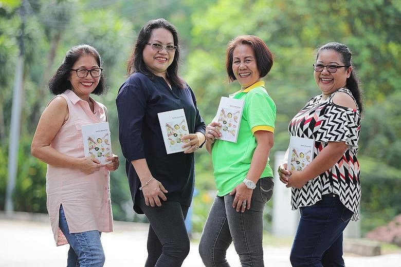 Four of the five authors of Family Favourites: (from left) Ms Lita Patricio, Ms Jetky Amores, Ms Jomarcy Bebida and Ms Carina Rebuya. Fellow author Rose Buenvenida has returned to the Philippines. Ms Patricio's favourite fish curry dish (below) is fe