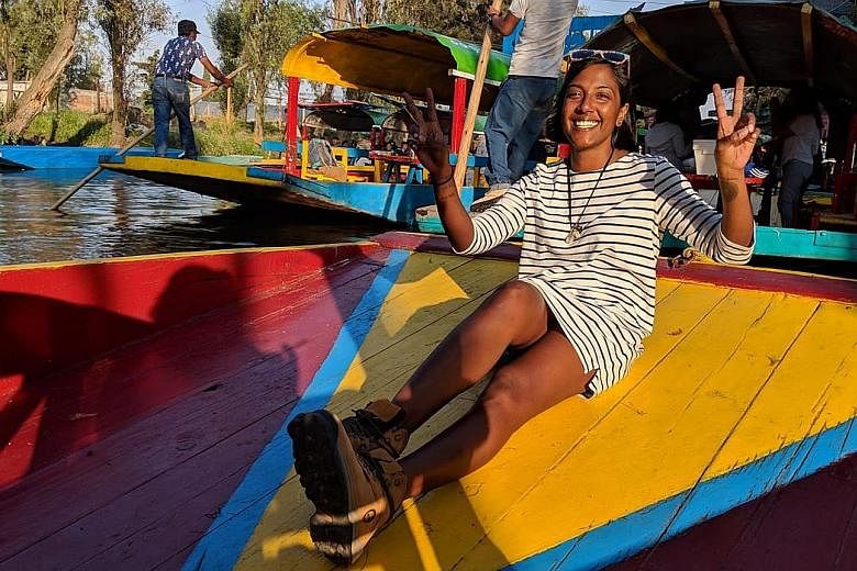 Digital nomad Crunch Ranjani Rajandran (left, in a photo taken in Xochimilco, Mexico) has a flexible writing career that takes her around the world. She can return to Singapore when she needs to, such as to take care of her mother.