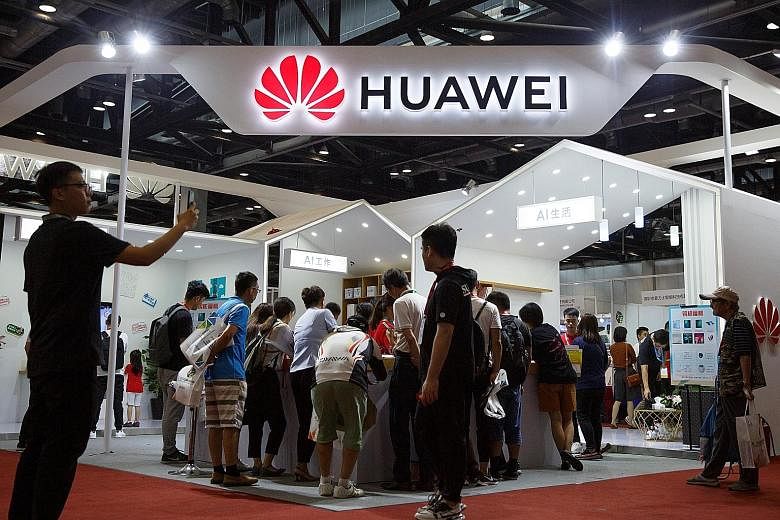 The Huawei booth at the International Consumer Electronics Expo in Beijing early this month. Going hard on Huawei was the wrong way for the United States to confront China over its grievances - even if many of them are entirely valid, says the writer