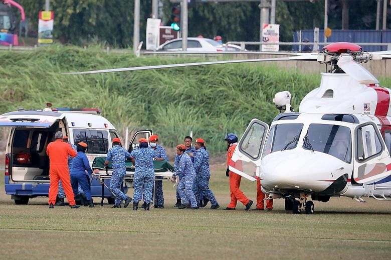 The body of Irish teenager Nora Anne Quoirin, who had been missing since Aug 4, being taken out of a helicopter in Seremban, Malaysia. Hikers found Nora's body at a stream in a ravine just 2km away from The Dusun eco-resort, where she and her family 