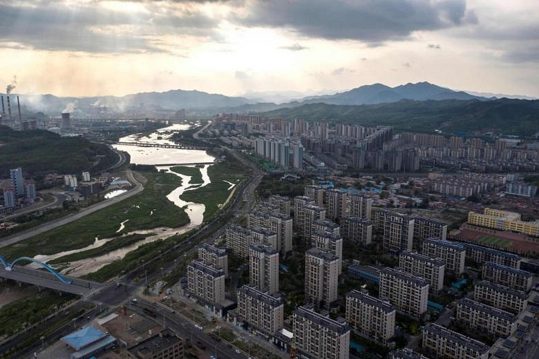 China Home Price Growth Slowest In 5 Months As Curbs Bite | The Straits ...