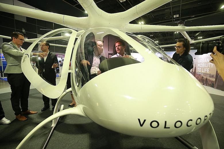 A prototype of Volocopter's air taxi, based on drone technology and powered by electricity, on display at the Aviation Open House. The company plans to conduct trials in Singapore by the end of this year.