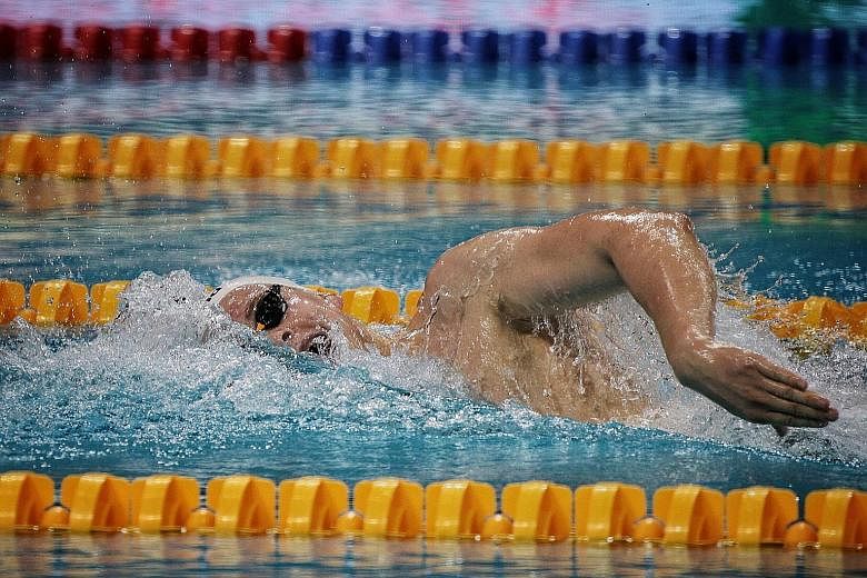 Danas Rapsys en route to winning the 400m freestyle event on the first day of the Fina Swimming World Cup at the OCBC Aquatic Centre yesterday. It was his third win in the event, after victories in the Tokyo and Jinan legs. ST PHOTOS: JASON QUAH