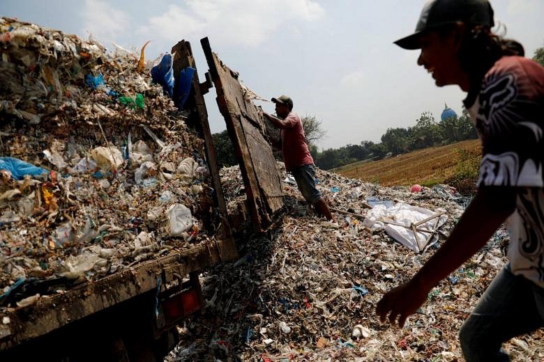 Cash For Trash: Indonesia Village Banks On Waste Recycling | The ...