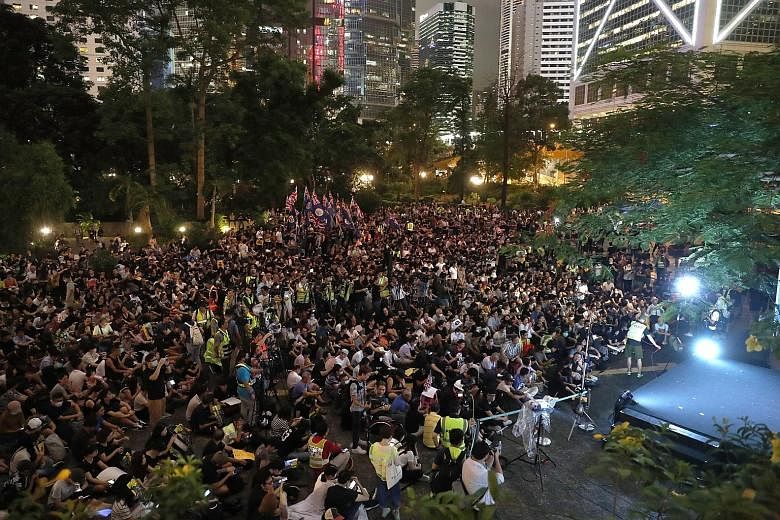 Protesters at Chater Garden attending a pro-independence rally calling for foreign intervention in Hong Kong yesterday. PHOTO: EPA-EFE