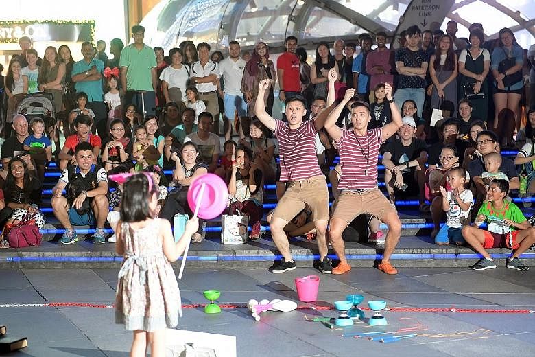 In this photo taken in 2016, Jonathan Goh (far left) and Edwin Ong pair up as The Annoying Brothers to perform in Orchard Road.