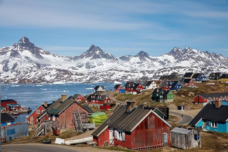 Snow-covered mountains surrounding the harbour and town of Tasiilaq, Greenland. A New York Times report on Thursday said that US President Donald Trump had repeatedly asked about the possibility of buying Greenland for its natural wealth and security