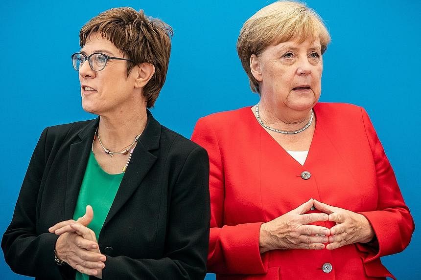 Will Ms Annegret Kramp-Karrenbauer (left),leader of the Christian Democratic Party take over from Dr Angela Merkel as the next German chancellor?