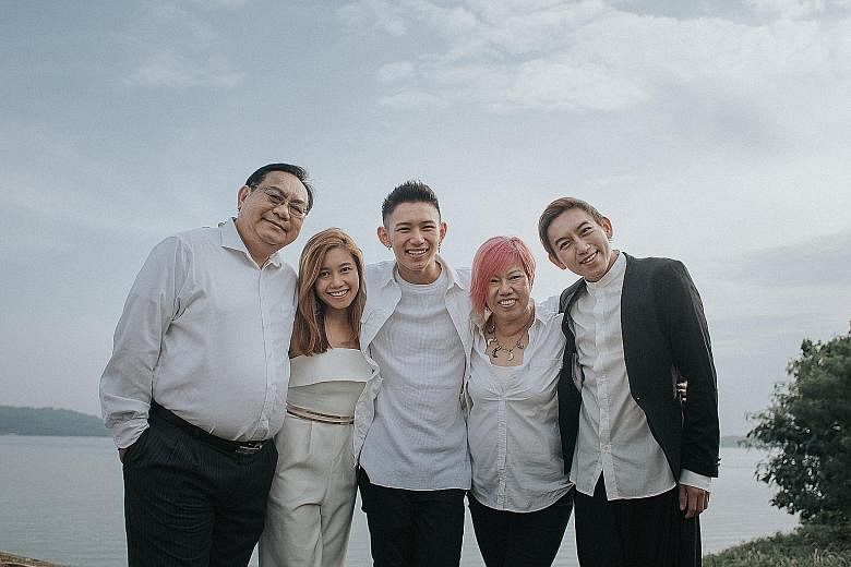 Madam Puah with (from left) her husband Peng Mun Kit, 56, her daughter Ranie, 27, and her sons Louis, 24, and Eugene, 26, during a family photo shoot at Coney Island last year. Above: Madam Puah and Mr Tan Eng Soon (in the green kayak) posing for a p
