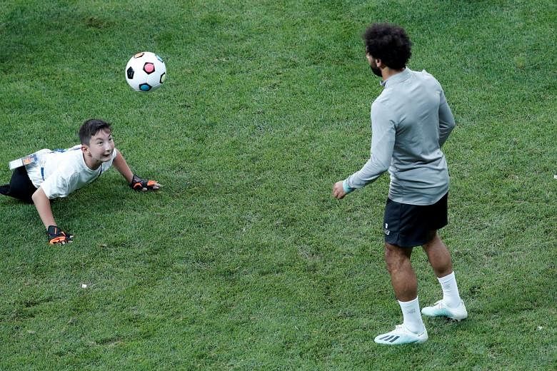 SWEET TWEETS #1 Liverpool's Mohamed Salah playing keepy-uppy with a boy from the Uefa Foundation before the Uefa Super Cup. WATCH: bit.ly/2Z7V0Qw SWEET TWEETS #2 "I was meant to be doing a swim clinic but just ended up racing all the kids." Australia