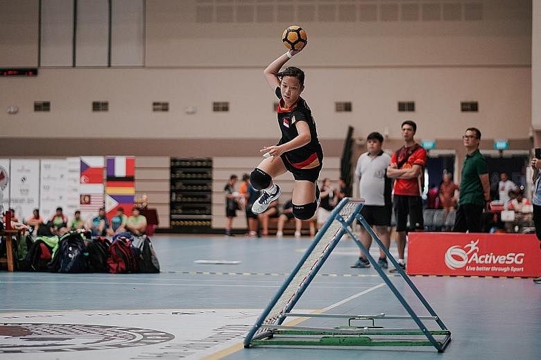 Celine Sheum scoring a goal as the Singapore U-18 girls beat Chinese Taipei 38-30 in the final at the World Youth Tchoukball Championships. ST PHOTO: ONG WEE KIAT