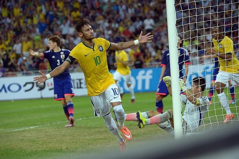 The last time Brazil played in Singapore, fans were treated to a samba show, with captain Neymar scoring all the goals in their 4-0 demolition of Japan in a friendly match at the new Singapore National Stadium in 2014. ST FILE PHOTO