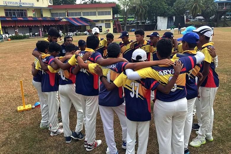The Anglo-Chinese School (Independent) cricket players celebrating after beating Raffles Institution by 40 runs in the Schools National C Division final at the Ceylon Sports Club yesterday. Captain Pranav Nitin (67) and Thiyanesh (19) put on a third-