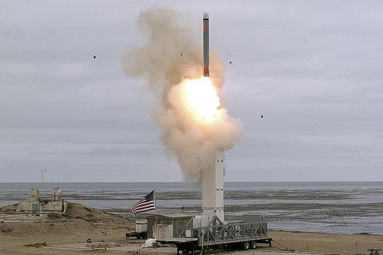 A US Department of Defence photo showing the flight test of a ground-launched cruise missile on San Nicolas Island, California, on Sunday. The test missile accurately hit its target after more than 500km of flight. The launch is seen as a sign of Was