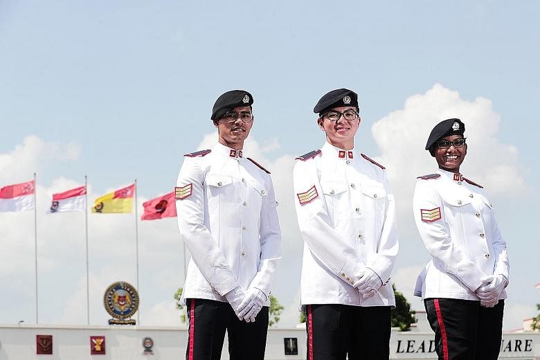 (From left) Armoured infantry specialist Saif Erfan Mohamed, 20; cyber specialist Tan Jia Le, who received one of 13 Golden Bayonets; and signals specialist Thaneswari P. Manoharan, 23, were among those who took part in the 40th Specialist Cadet Grad