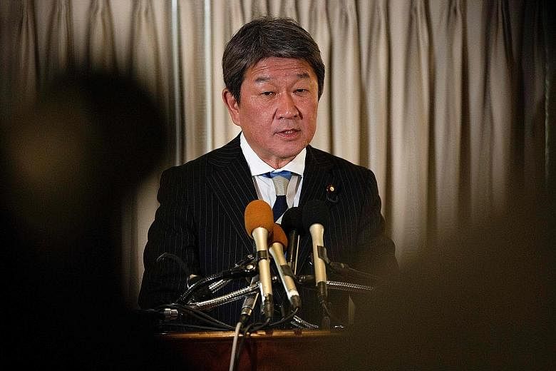 Japan's Economy Minister Toshimitsu Motegi is in Washington for trade talks.
