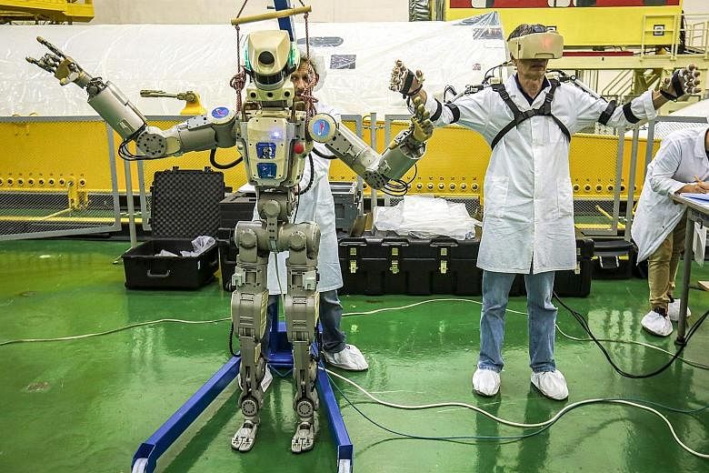 Russia's humanoid robot, Fedor, being tested last month ahead of its flight yesterday on board the Soyuz MS-14 spacecraft bound for the International Space Station. Fedor copies human movements, a key skill that allows it to remotely help astronauts.