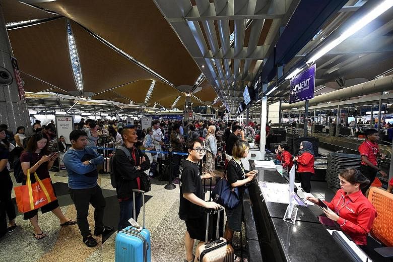 KLIA's main terminal was still experiencing some delays, but "the situation is improving due to measures that have been put in place", Malaysia Airports group chief executive officer Raja Azmi Raja Nazuddin said yesterday. Passengers have been urged 