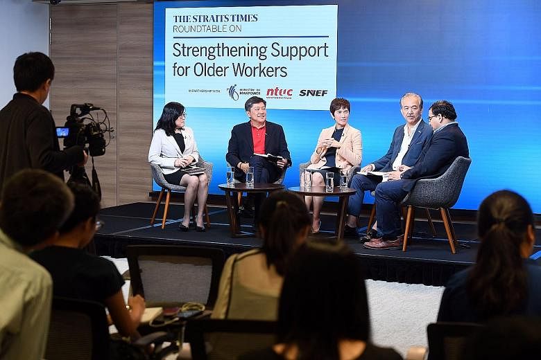 (From left) Associate Professor Chia Ngee Choon, labour chief Ng Chee Meng, Manpower Minister Josephine Teo, Singapore National Employers Federation president Robert Yap and ST news editor Zakir Hussain, who moderated the discussion, at a roundtable 