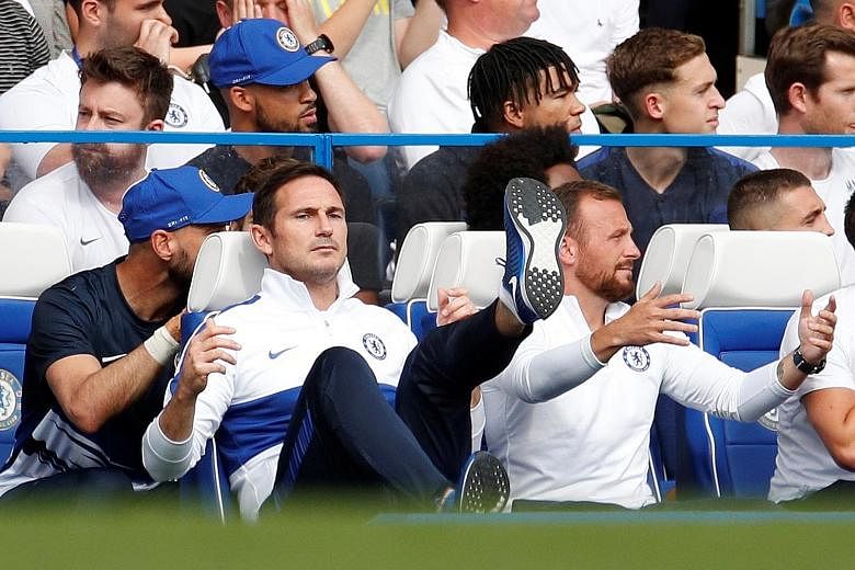 Chelsea manager Frank Lampard (left) and his assistant Jody Morris bemoan a wasted opportunity in last week's 1-1 draw with Leicester City. Lampard has been accused of being too gung-ho in his tactical approach. 