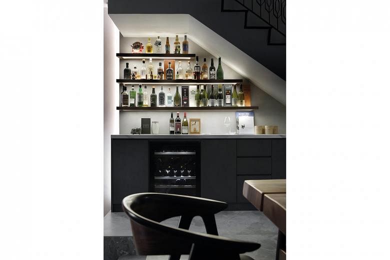 The homeowner opted for a stylish bar area next to the dining room to entertain family and friends.