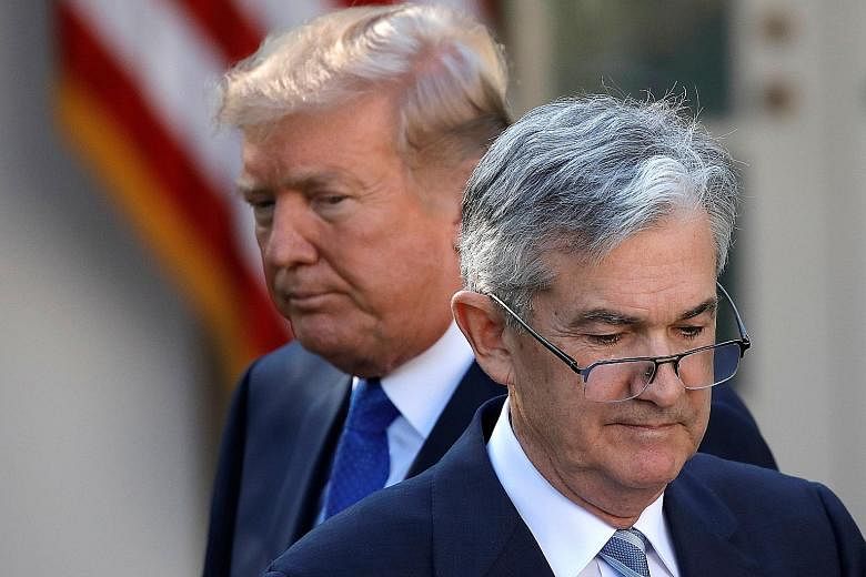 President Donald Trump at the White House in 2017 with his then nominee for Federal Reserve chairman, Mr Jerome Powell.