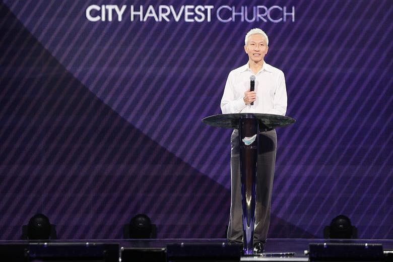 City Harvest Church founder Kong Hee speaking to the congregation yesterday, in his first service at the church since his release from jail on Thursday.