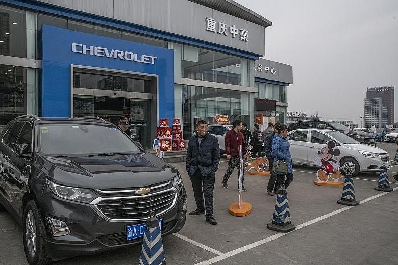 A Chevrolet dealership in Chongqing city in south-west China. United States President Donald Trump has ordered US companies to stop doing business in China and raised tariffs by 5 per cent on Chinese imports. Meanwhile, China has imposed additional t