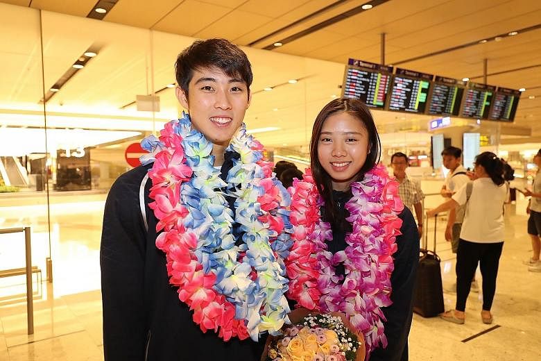Loh Kean Yew, 22, and Yeo Jia Min, 20, back in Singapore after their fine run at the World Championships in Basel, Switzerland. Yeo even had an upset win over world No. 1 Akane Yamaguchi en route to the last eight. PHOTO: LIANHE ZAOBAO