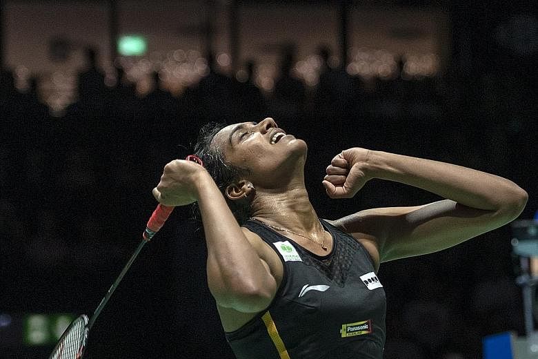 P.V. Sindhu has become the first Indian player to win gold at the BWF World Championships. She took just 36 minutes to crush third seed Nozomi Okuhara 21-7, 21-7 in Basel yesterday. PHOTO: EPA-EFE