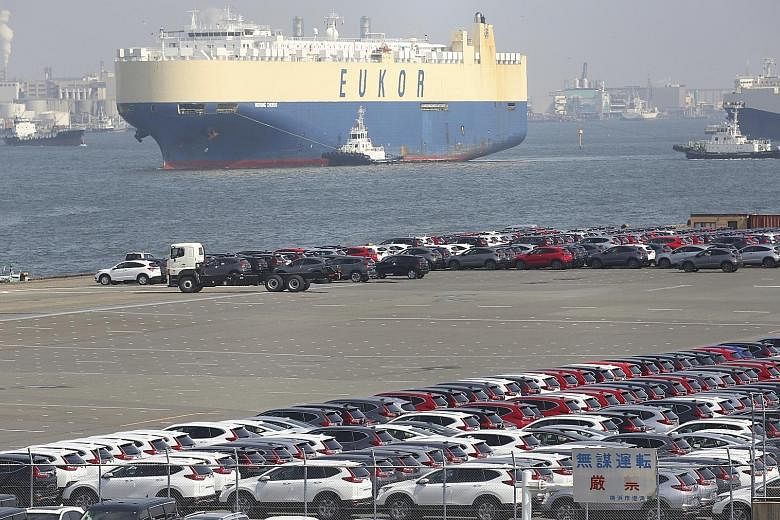 Japanese vehicles for export at a port in Yokohama, near Tokyo, earlier this year. Japanese Prime Minister Shinzo Abe and US President Donald Trump agreed to a deal on Sunday that will see Tokyo reduce levies on US agricultural produce. But Tokyo did