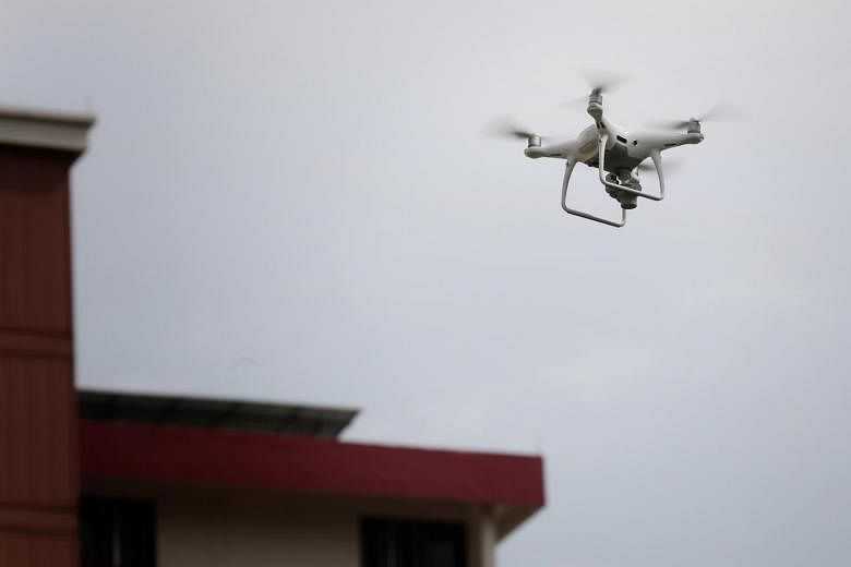 lid clue Shine Mandatory drone registration, minimum age of 16 for drone operators  proposed by advisory panel | The Straits Times